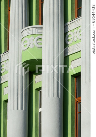 Restored old multi-storey building with antique columns, painted Restored old multi-storey building with antique columns, painted 69544438