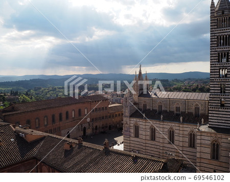 Light from the sky and the cityscape of Siena Light from the sky and the cityscape of Siena 69546102