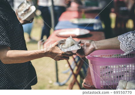 Food donation to relieve hunger. The concept of poverty Food donation to relieve hunger. The concept of poverty 69550770