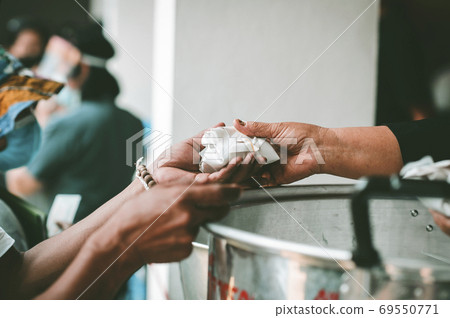 Food donation to relieve hunger. The concept of poverty Food donation to relieve hunger. The concept of poverty 69550771