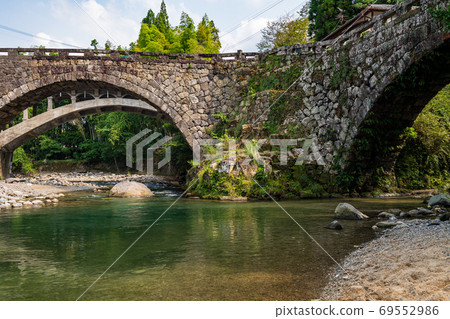 Futamata Bridge over the clear stream Midori River flowing through Misato Town and the sacred place for lovers 69552986