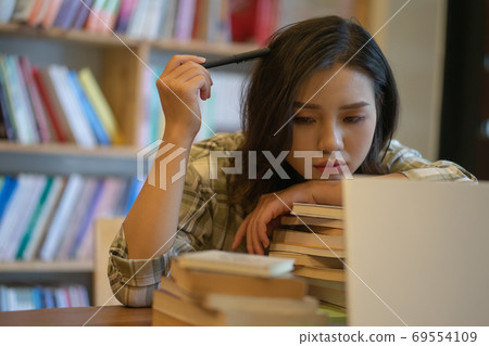 Woman in library 69554109