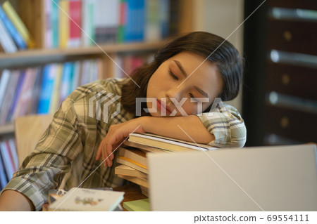 Woman in library 69554111