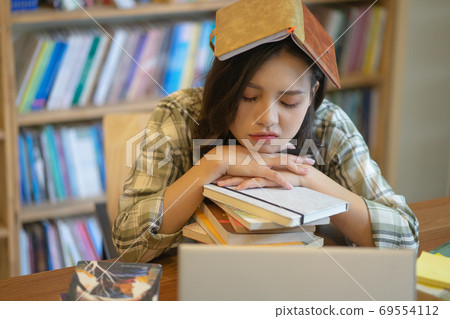 Woman in library 69554112