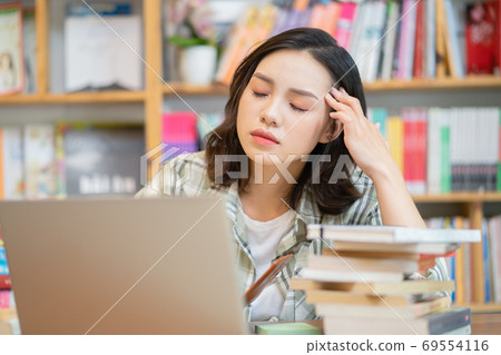 Woman in library 69554116
