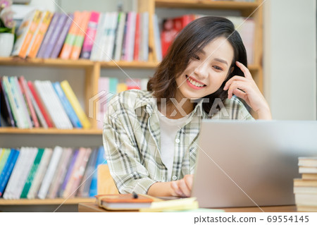 Woman in library 69554145