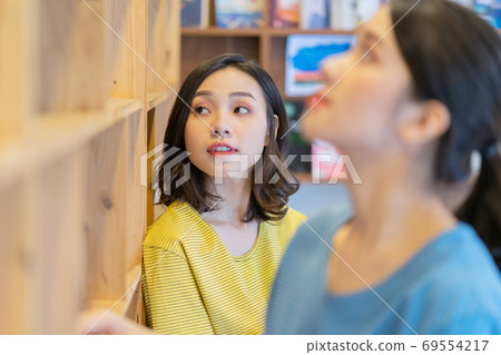 Woman in library 69554217