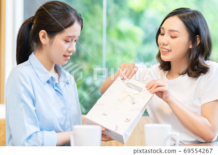 Woman, gift, holiday 69554267