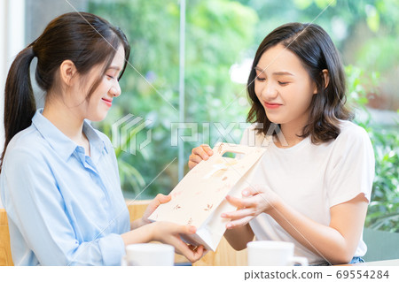 Woman, gift, holiday 69554284