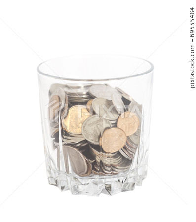 glass with money isolated on white 69555484