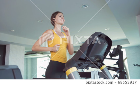 Portrait of fit white healthy woman, caucasian person, running o Portrait of fit white healthy woman, caucasian person, running o 69555917