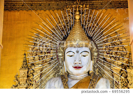 Large White Marble Buddha Statue in Kyauktawgyi Paya, Mandalay, Myanmar Burma Large White Marble Buddha Statue in Kyauktawgyi Paya, Mandalay, Myanmar Burma 69556295