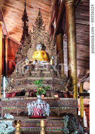 Buddha in the Nga Phe Kyaung Monastery at Inle Lake, Myanmar former Burma Buddha in the Nga Phe Kyaung Monastery at Inle Lake, Myanmar former Burma 69556324