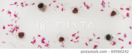 Glasses with red wine and pink flowers, copy Glasses with red wine and pink flowers, copy 69560242