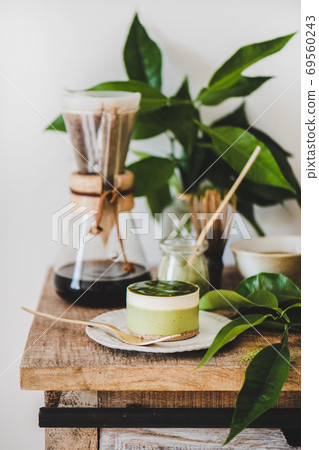 Green matcha cheesecake and brewed pour-over Green matcha cheesecake and brewed pour-over 69560243