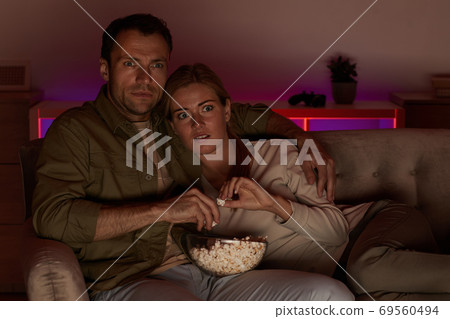 Couple watching scary movie 69560494