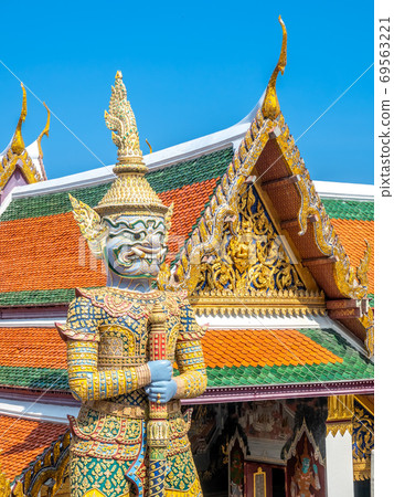The great iconic giant, from Ramayana literature, act as guard protect entrance of The Temple of Emerald Buddha in Bangkok, Thailand The great iconic giant, from Ramayana literature, act as guard protect entrance of The Temple of Emerald Buddha in Bangkok, Thailand 69563221