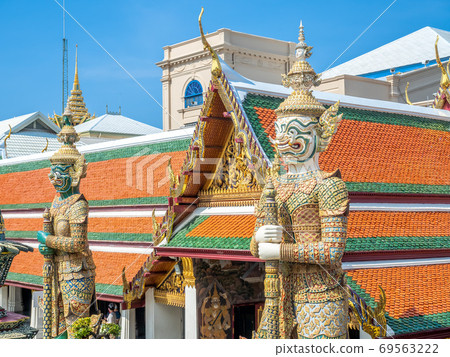 The great iconic giant, from Ramayana literature, act as guard protect entrance of The Temple of Emerald Buddha in Bangkok, Thailand 69563222