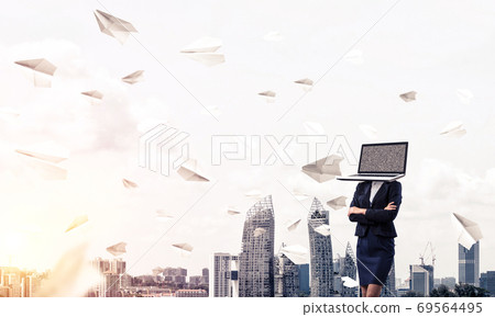 Business woman with laptop instead of head. Business woman with laptop instead of head. 69564495