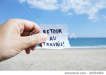 text back to work in french in a note on the beach text back to work in french in a note on the beach 69564868