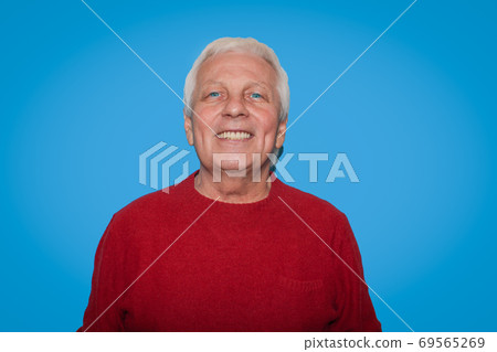 Senior handsome man with grey hair Senior handsome man with grey hair 69565269