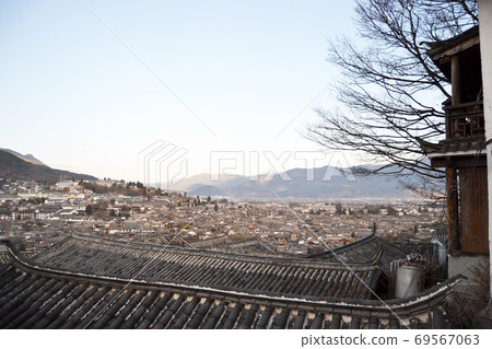 lijiang old town, the world heritage site of UNESCO, the old house roof of aerial view on the hill lijiang old town, the world heritage site of UNESCO, the old house roof of aerial view on the hill 69567063