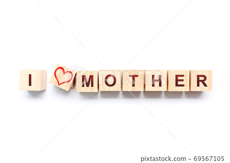 Wooden dice with the phrase I LOVE MOTHER. Mother's Day concept Wooden dice with the phrase I LOVE MOTHER. Mother's Day concept 69567105