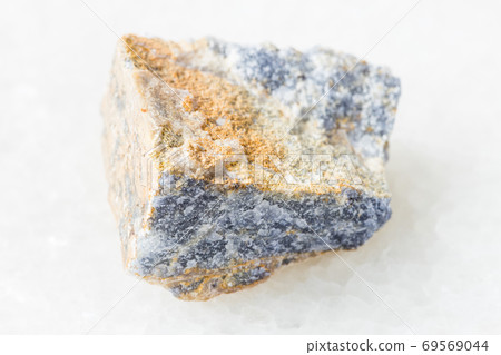 unpolished Corundum rock on white marble unpolished Corundum rock on white marble 69569044