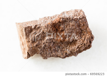 rough Bauxite rock on white marble 69569223