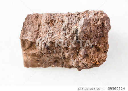 unpolished Bauxite rock on white marble 69569224