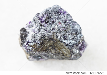 unpolished Stibnite (Antimonite) ore on white 69569225