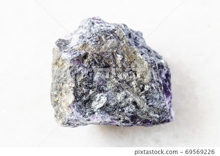 rough Stibnite (Antimonite) ore on white marble 69569226