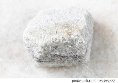 rough Marble rock on white marble 69569228