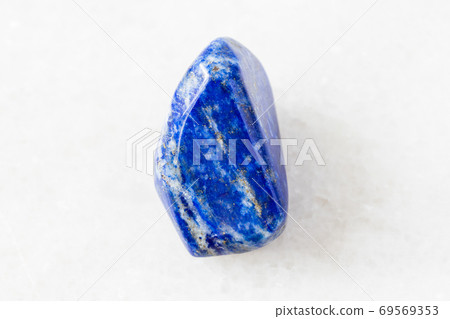 tumbled Lapis Lazuli (Lazurite) rock on white 69569353