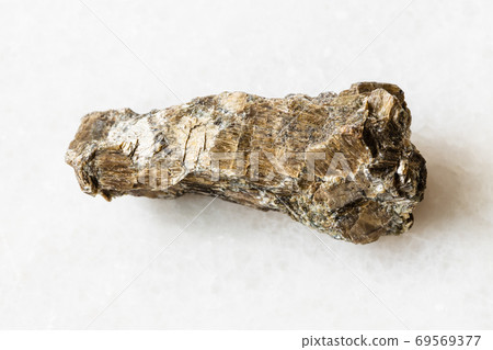 unpolished Bronzite (Enstatite) rock on white unpolished Bronzite (Enstatite) rock on white 69569377