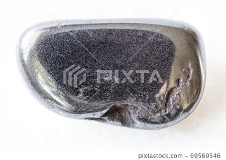 tumbled Hematite rock on white marble 69569546