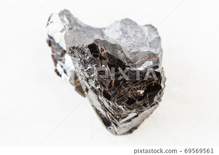unpolished Sphalerite (zink blende) rock on white 69569561