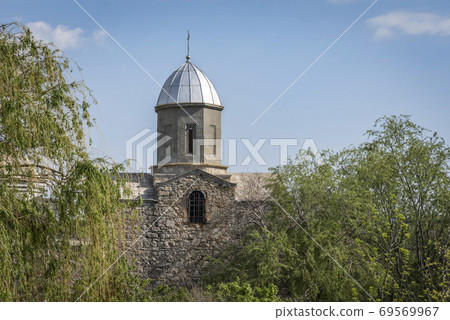 Dome of the medieval Church of the Iberian Icon of the Mother Of God in the city of Feodosia on the Crimean Peninsula, built by colonists from Genoa in 14 century 69569967