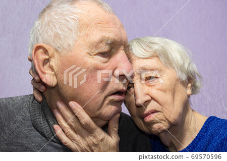 Portrait of a sad elder couple at home 69570596