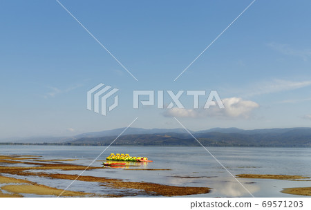 Pedal boats on Lake Trasimeno Pedal boats on Lake Trasimeno 69571203