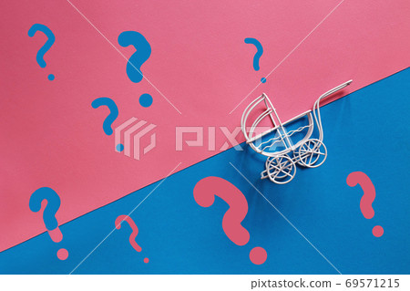 vintage baby stroller on a pink and blue background. Boy or girl question 69571215