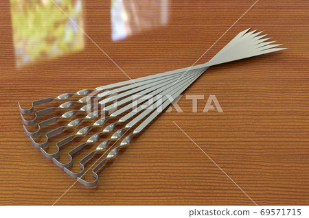 Set of skewers on the wooden table. 3D rendering 69571715