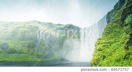 Skogarfoss waterfall and summer day, Iceland 69571757