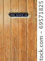 Texture of old wooden door, men toilet 69571825