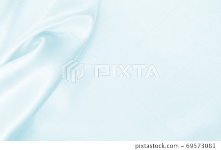 Smooth elegant blue silk or satin luxury cloth texture as abstract background. Luxurious background design Smooth elegant blue silk or satin luxury cloth texture as abstract background. Luxurious background design 69573081