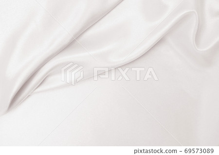 Smooth elegant golden silk or satin luxury cloth texture as wedding background. Luxurious background design. In Sepia toned. Retro style Smooth elegant golden silk or satin luxury cloth texture as wedding background. Luxurious background design. In Sepia toned. Retro style 69573089