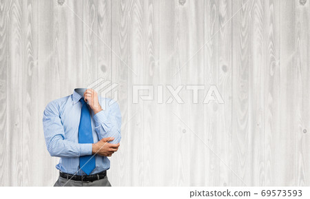 Headless pensive businessman 69573593