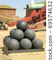 Stacked cannonballs 69574632