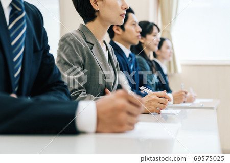 Business person receiving training Business person receiving training 69575025