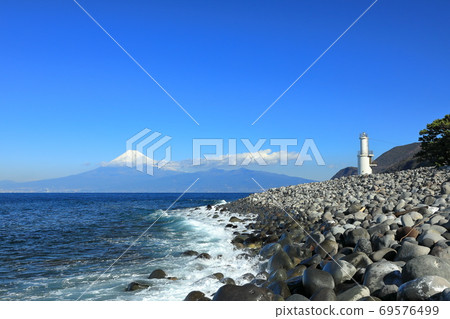 Mt. Fuji and lighthouse over Suruga Bay, Shizuoka Prefecture 69576499
